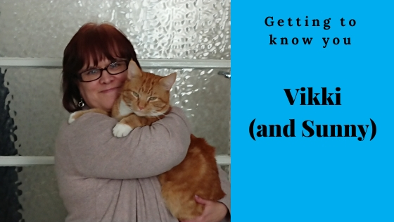 Vikki cuddling Sunny the ginger cat