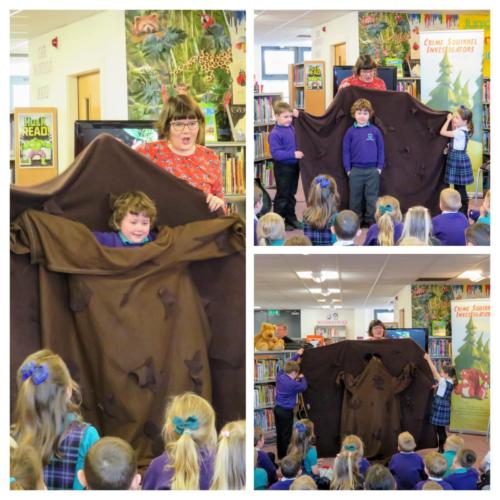 Demonstrating camouflage with Kinnaird pupils at Larbert Library.